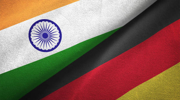 istock Germany and India two flags together textile cloth fabric texture 1093162086