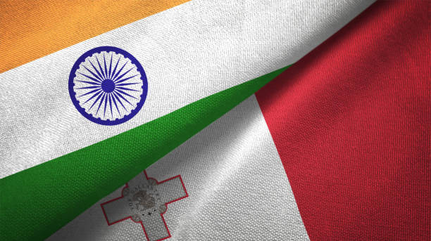 istock Malta and India two flags together textile cloth fabric texture 1093162624