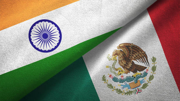istock Mexico and India two flags together textile cloth fabric texture 1093162664