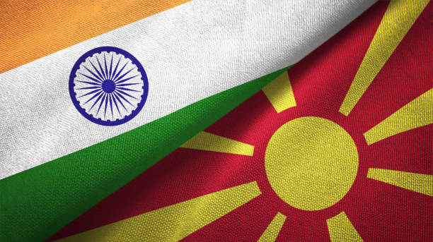 istock Macedonia and India two flags together textile cloth fabric texture 1093162696