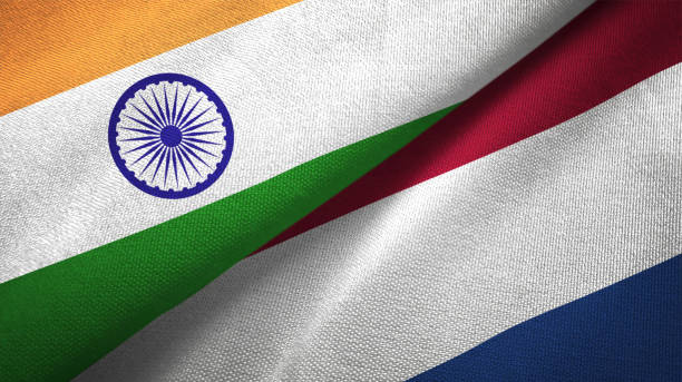 istock Netherlands and India two flags together textile cloth fabric texture 1093162730