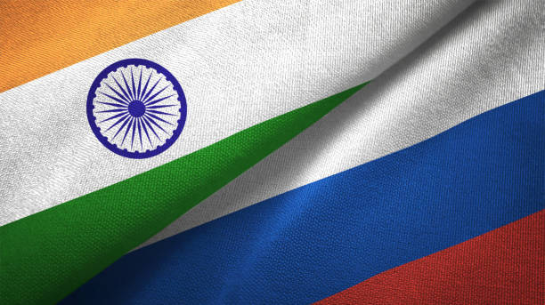 istock Russia and India two flags together textile cloth fabric texture 1093162892