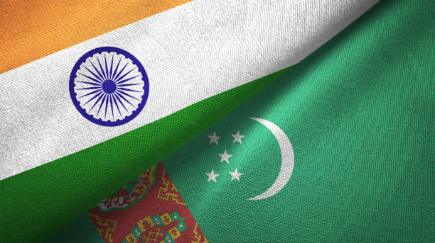 istock Turkmenistan and India two flags together textile cloth fabric texture 1093163190