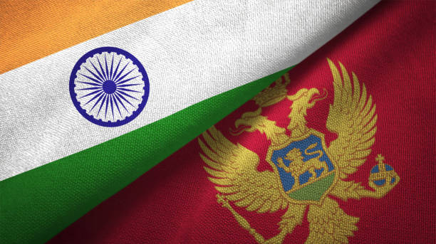 istock Montenegro and India two flags together textile cloth fabric texture 1093164948