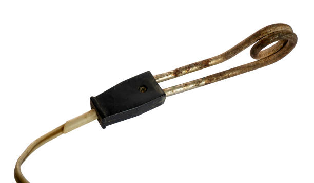 istock Old immersion heater isolated on white background 1093172554