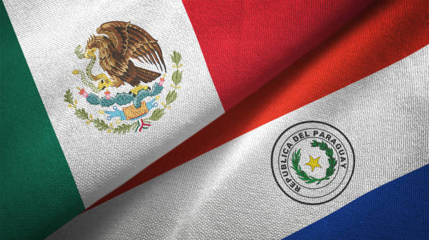 istock Paraguay and Mexico two flags together textile cloth fabric texture 1093173448