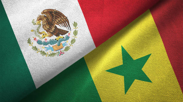 istock Senegal and Mexico two flags together textile cloth fabric texture 1093173606