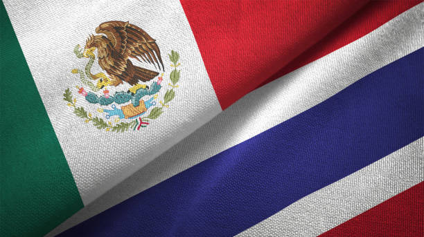 istock Thailand and Mexico two flags together textile cloth fabric texture 1093174904