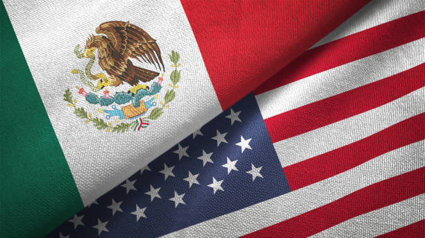 istock United States and Mexico two flags together textile cloth fabric texture 1093175040