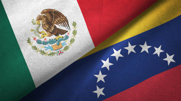 istock Venezuela and Mexico two flags together textile cloth fabric texture 1093175158