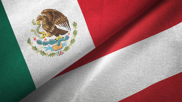 istock Austria and Mexico two flags together textile cloth fabric texture 1093175322