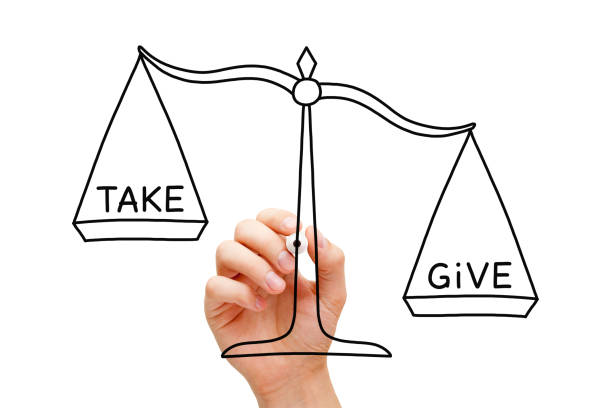 istock Give More Than You Take Scale Concept 1093177558