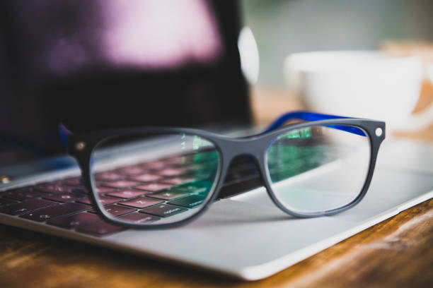 istock Glasses on laptop with coffee 1093187780