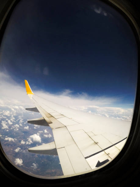istock Clouds view from a commercial airplane window. 1093197606