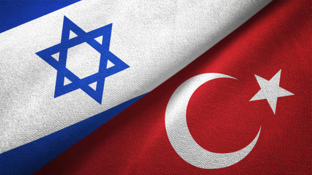 istock Turkey and Israel two flags together textile cloth fabric texture 1093197872