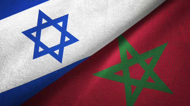 istock Morocco and Israel two flags together textile cloth fabric texture 1093199576