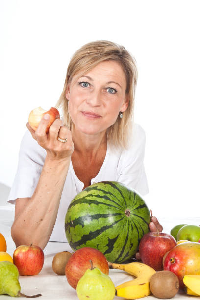 istock woman with fruit 1093202270