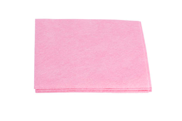 istock pink cleaning rag neatly folded, isolated on white 1093202560
