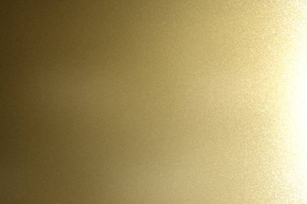 istock Texture of reflection on rough dark gold metal wall, abstract background 1093204606