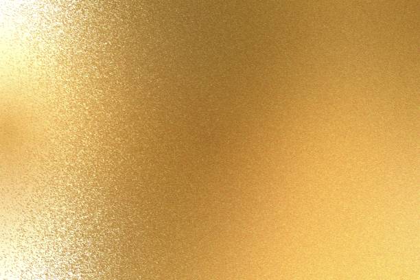 istock Texture of reflection on rough light gold metal sheet, abstract background 1093204620
