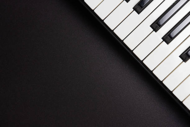 istock Piano keys on black background 1093204684
