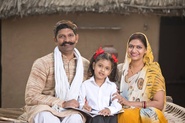 istock Rural parents helping daughter to do school homework 1093207024