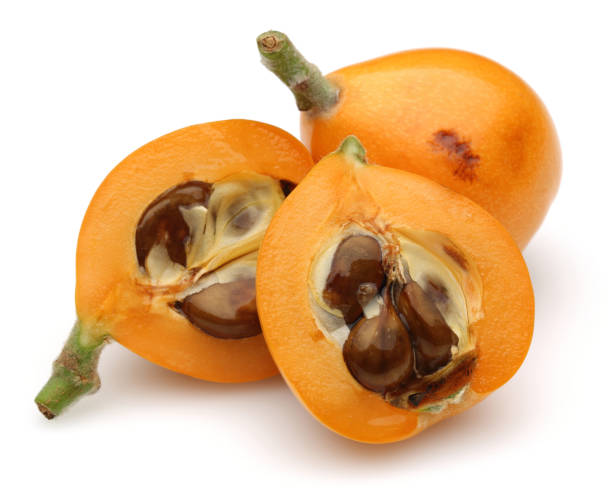 istock Ripe loquat, half and slice 1093207066