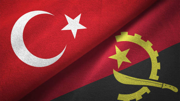 istock Angola and Turkey two flags together textile cloth fabric texture 1093207346
