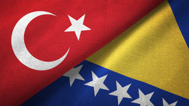 bosnia-erzegovina e turchia due bandiere insieme tessuto tessuto tessuto texture - bosnia herzegovinan flag foto e immagini stock