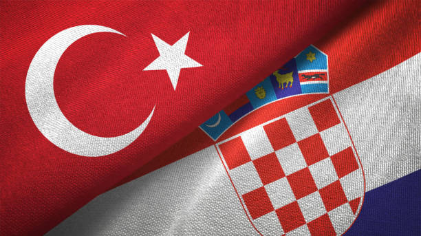 istock Croatia and Turkey two flags together textile cloth fabric texture 1093207490