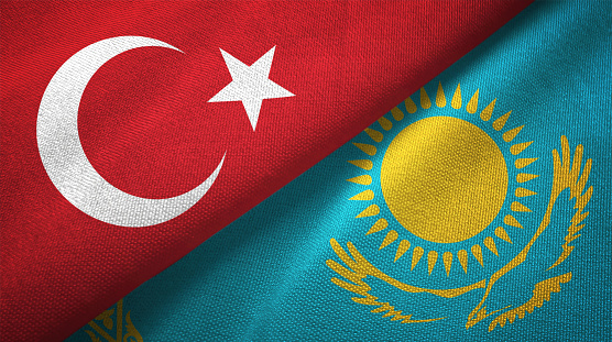 Kazakhstan and Turkey flag together realtions textile cloth fabric texture