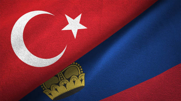 istock Liechtenstein and Turkey two flags together textile cloth fabric texture 1093208884