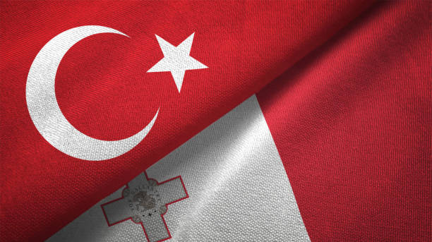 istock Malta and Turkey two flags together textile cloth fabric texture 1093208906