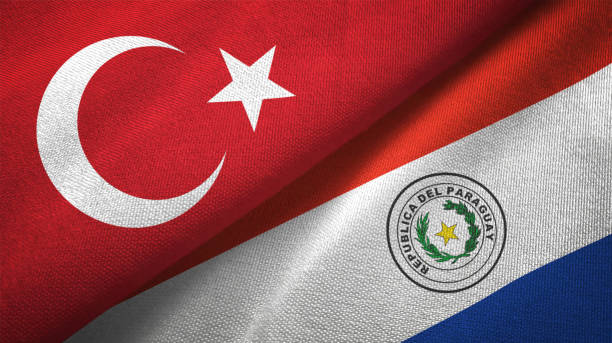 istock Paraguay and Turkey two flags together textile cloth fabric texture 1093209128