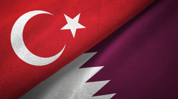 Qatar and Turkey two flags together textile cloth fabric texture Qatar and Turkey flag together realtions textile cloth fabric texture qatar flag stock pictures, royalty-free photos & images