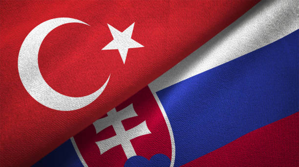 istock Slovakia and Turkey two flags together textile cloth fabric texture 1093209408