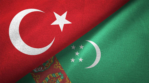 istock Turkmenistan and Turkey two flags together textile cloth fabric texture 1093209522