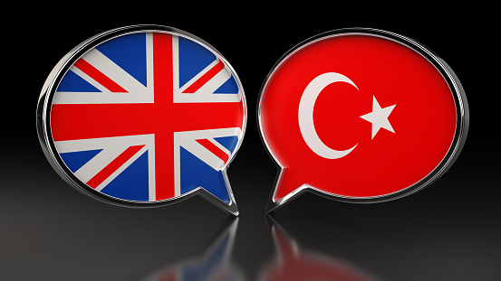 United Kingdom and Turkey flags with Speech Bubbles. 3D illustration