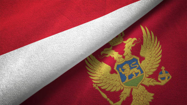 istock Montenegro and Indonesia two flags together textile cloth fabric texture 1093214552