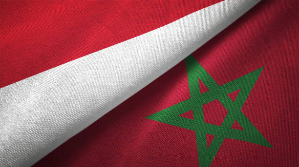 istock Morocco and Indonesia two flags together textile cloth fabric texture 1093214574