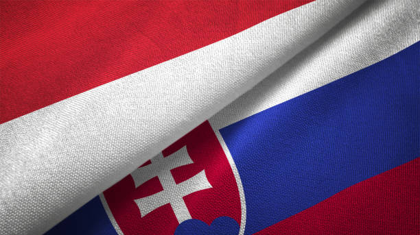 istock Slovakia and Indonesia two flags together textile cloth fabric texture 1093214768