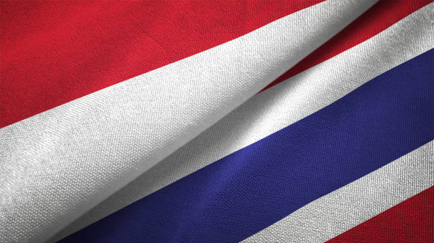 Thailand and Indonesia two flags together textile cloth fabric texture Thailand and Indonesia flag together realtions textile cloth fabric texture thailand flag round stock pictures, royalty-free photos & images
