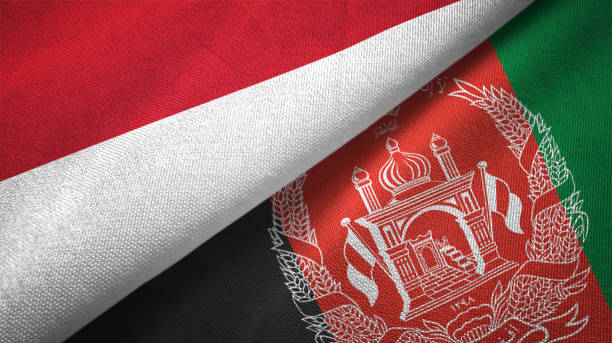 istock Afghanistan and Indonesia two flags together textile cloth fabric texture 1093217128