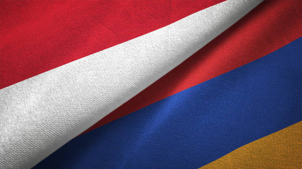 istock Armenia and Indonesia two flags together textile cloth fabric texture 1093217292