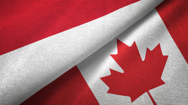 Canada and Indonesia two flags together textile cloth fabric texture