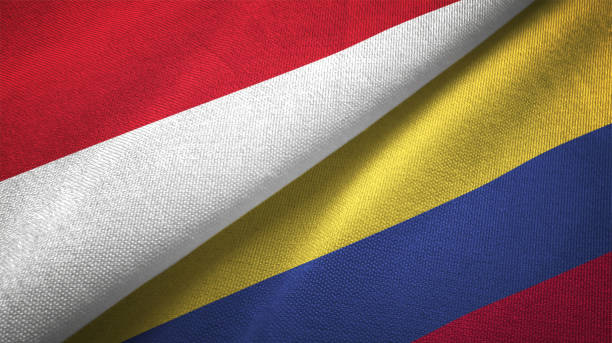 istock Colombia and Indonesia two flags together textile cloth fabric texture 1093217522