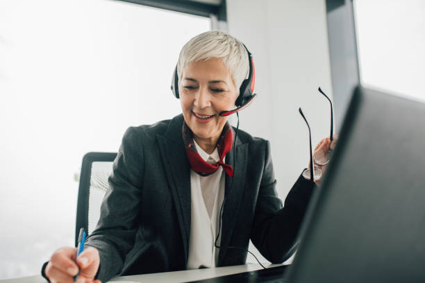 istock Woman working at all center 1093217926