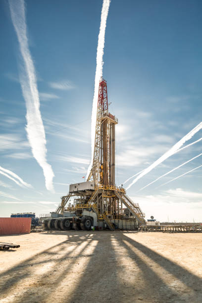 istock Oil drilling rig at sunset 1093221820