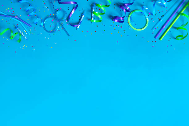 Bright festive blue background with party accessories