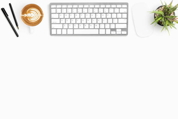 istock White office desk table with computer gadgets and office supplies. Top view with copy space, flat lay. 1093223154